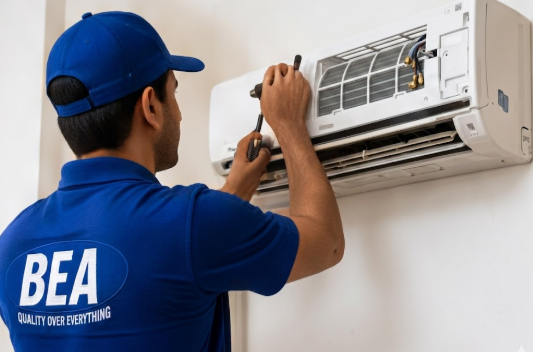 Technician installing appliance